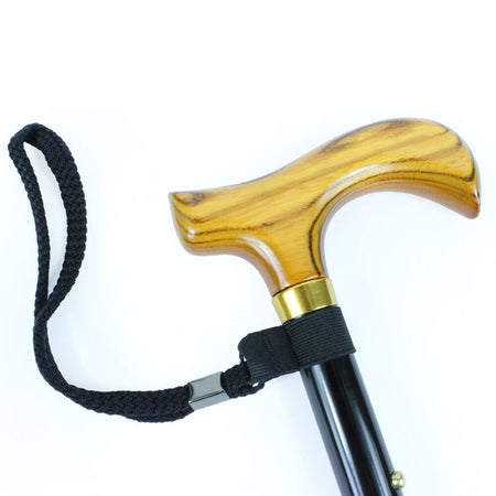 Close-up of the handle on Morris Mini Folding Walking Stick walking stick, highlighting the ergonomic grip.