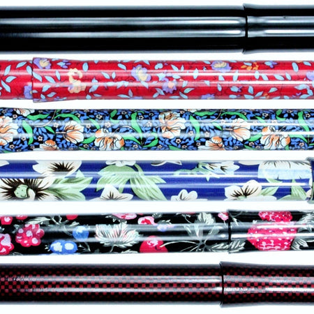 Close-up of the ferrule or base of Morris Mini Folding Walking Stick walking stick, showing the non-slip tip.