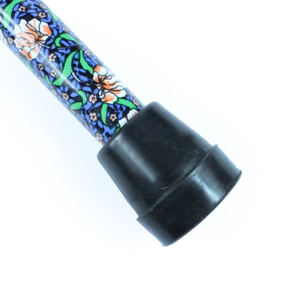 Morris Mini Folding Walking Stick walking stick in use by a person, demonstrating balance and support.