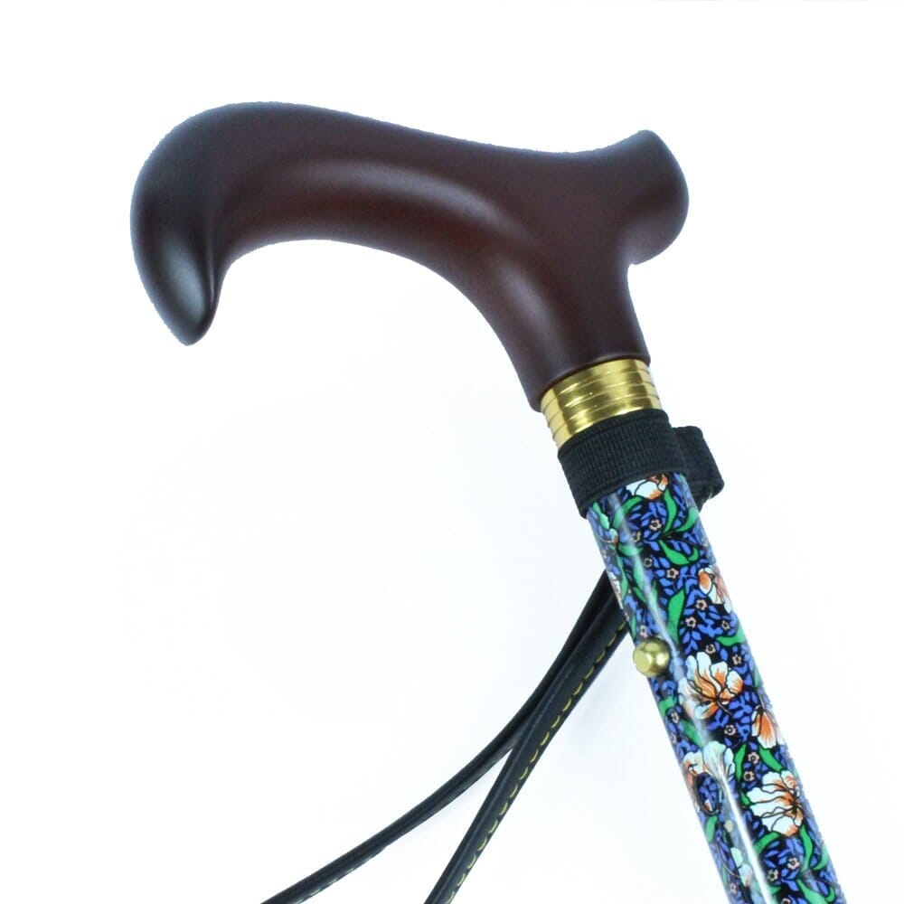 Close-up of the ferrule or base of Morris Mini Folding Walking Stick walking stick, showing the non-slip tip.
