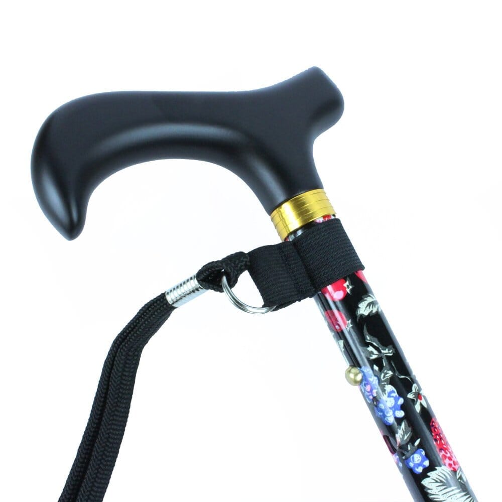 Close-up of the handle on Morris Mini Folding Walking Stick walking stick, highlighting the ergonomic grip.
