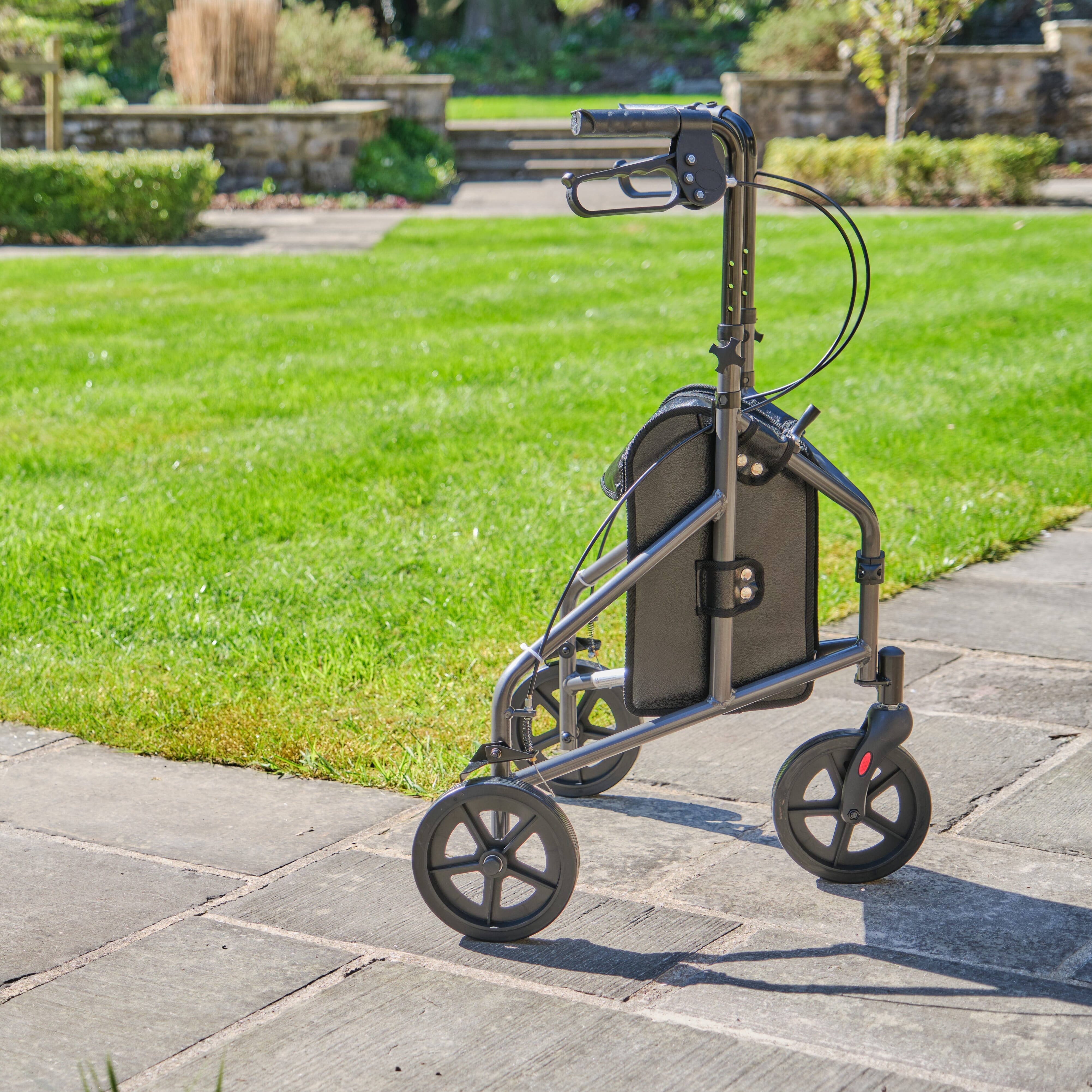 Angled view of NRS 3 Wheel Aluminium Rollator three-wheel rollator with basket or bag on a plain background.