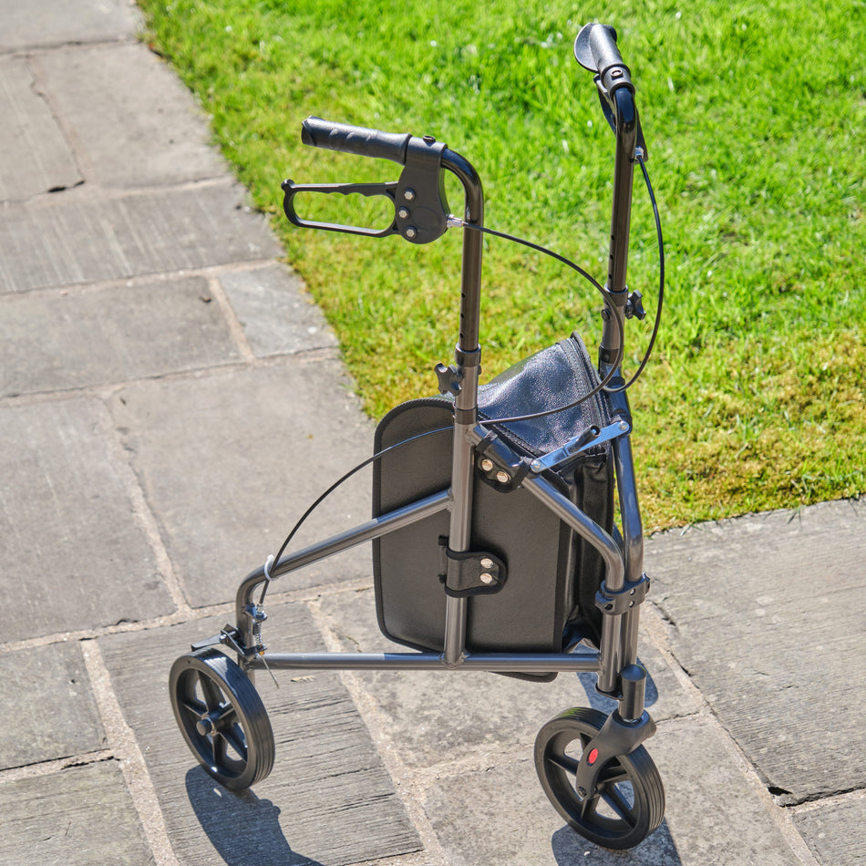 Front view of NRS 3 Wheel Aluminium Rollator three-wheel rollator showing handlebars, brake cables and single front wheel.
