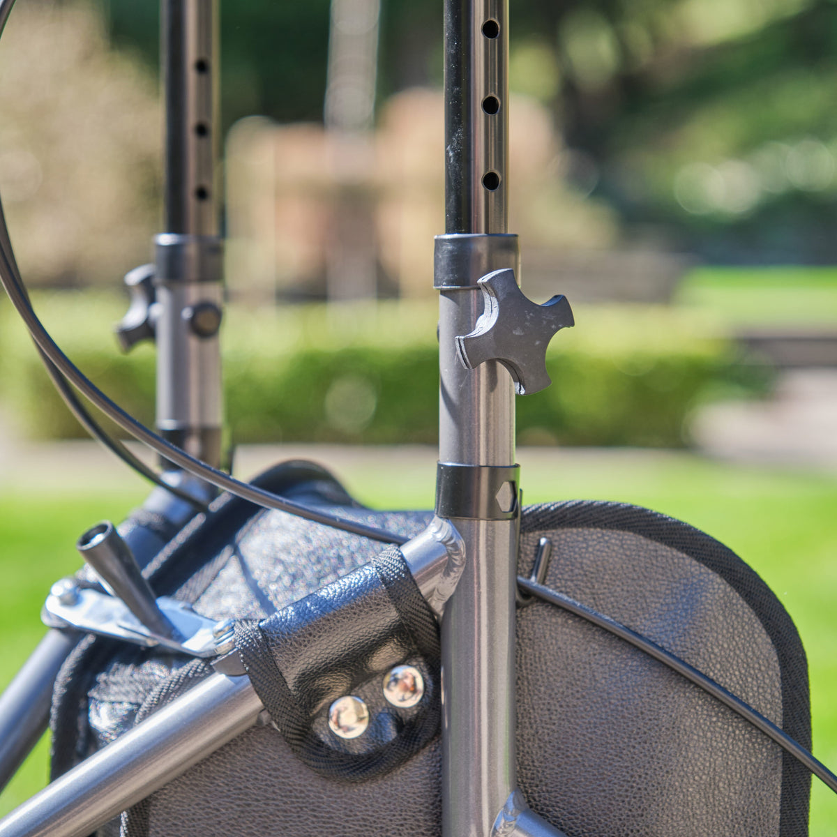 Close-up of the handle and brake lever on NRS 3 Wheel Aluminium Rollator rollator, emphasising the easy-grip design.
