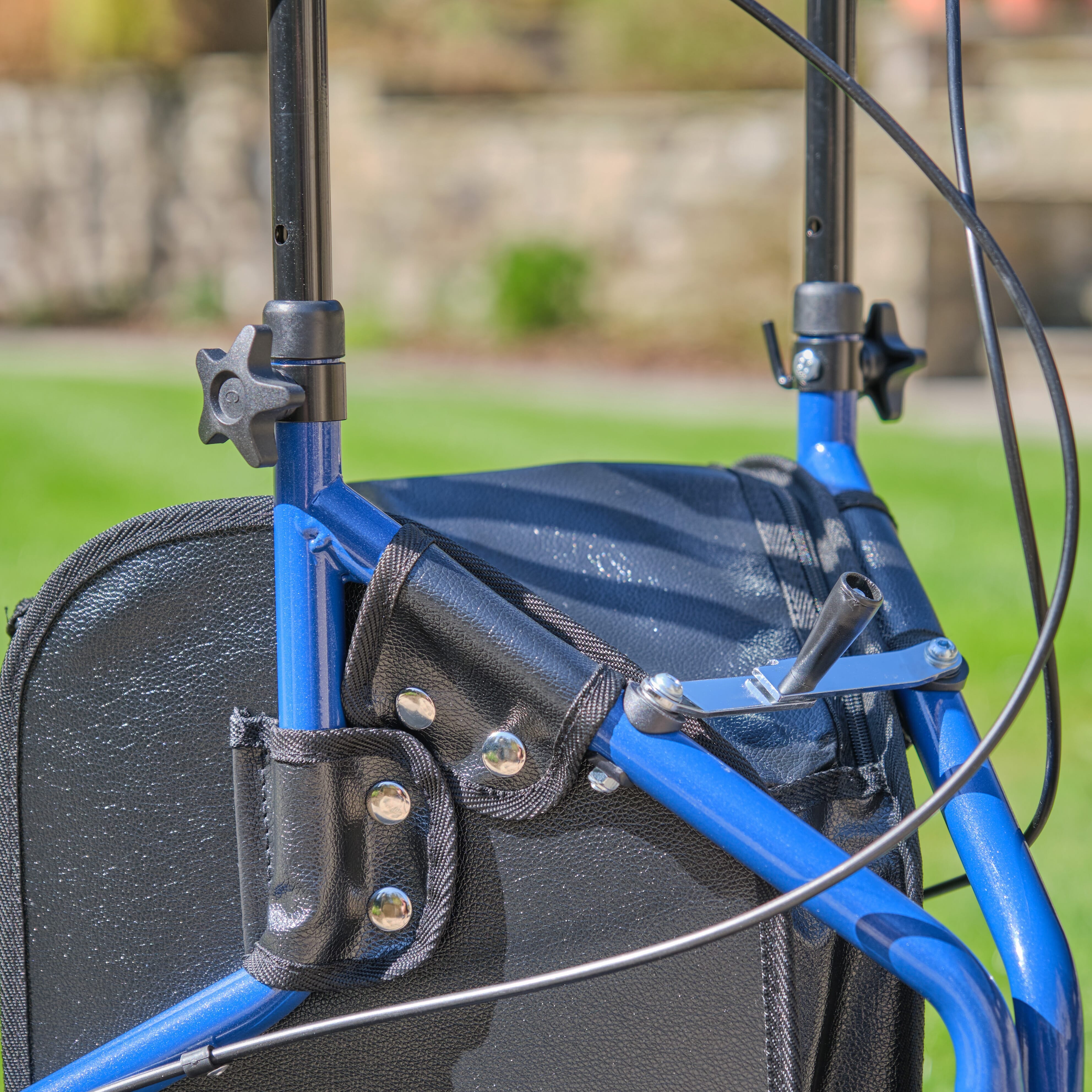 Front view of NRS 3 Wheel Steel Rollator three-wheel rollator showing handlebars, brake cables and single front wheel.