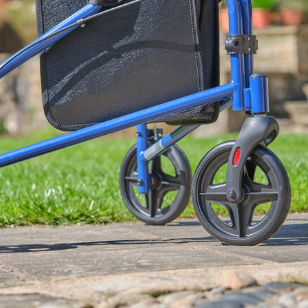 Side view of NRS 3 Wheel Steel Rollator three-wheel rollator, highlighting the triangular frame and rear wheels.