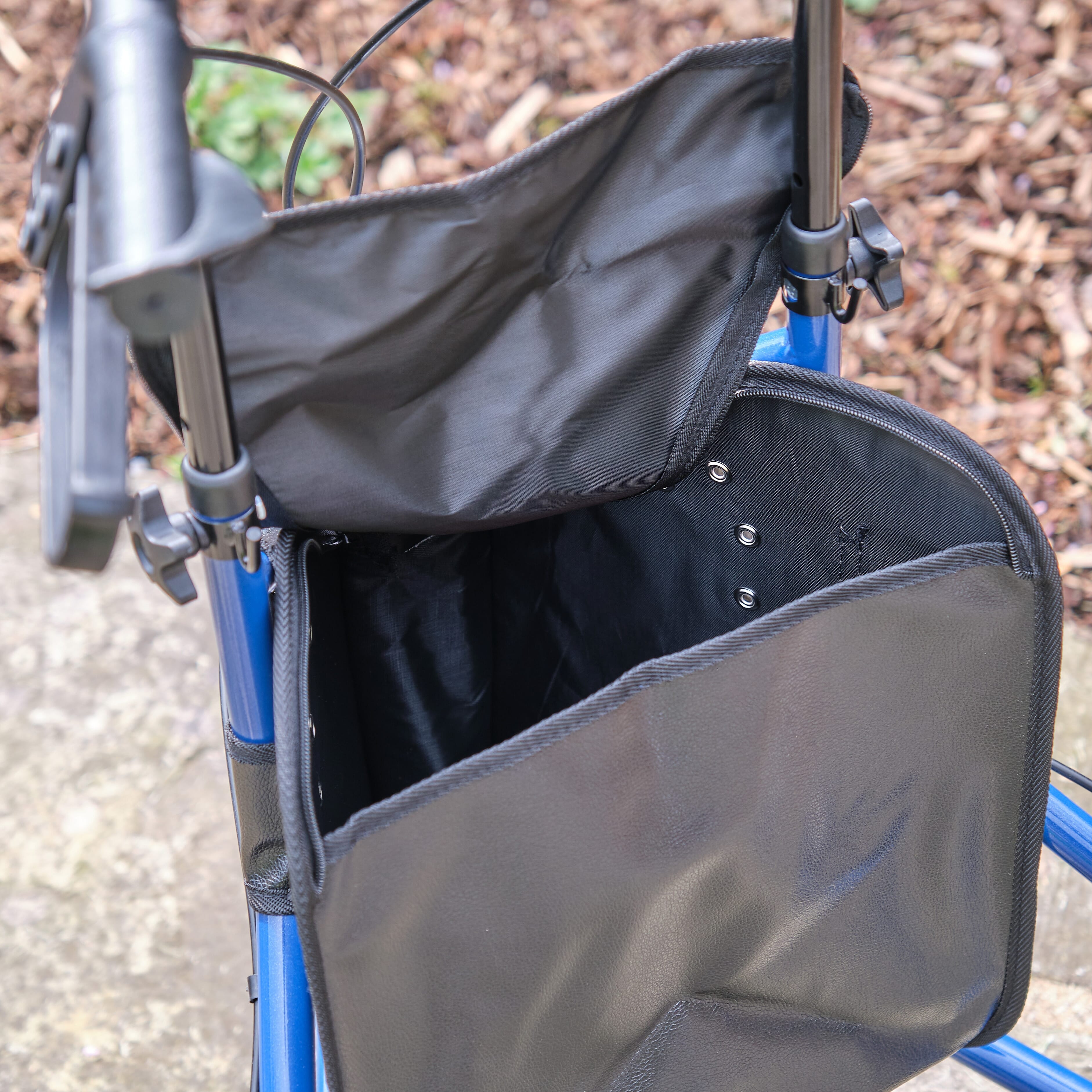Close-up of the handle and brake lever on NRS 3 Wheel Steel Rollator rollator, emphasising the easy-grip design.