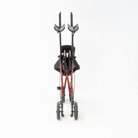 NRS 4 Wheel Forearm Rollator rollator folded from the front, demonstrating its slim, space-saving design.