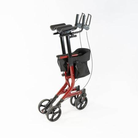 Fully folded NRS 4 Wheel Forearm Rollator rollator lying flat, showing the triple-fold mechanism and compact size.