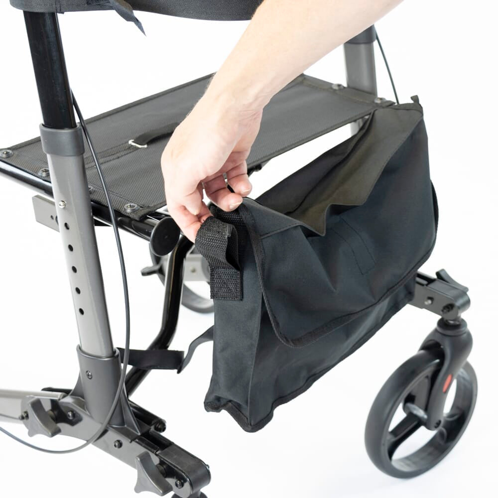Another view of the under-seat bag being adjusted on NRS 4 Wheel Triple Fold Aluminium Rollator rollator.