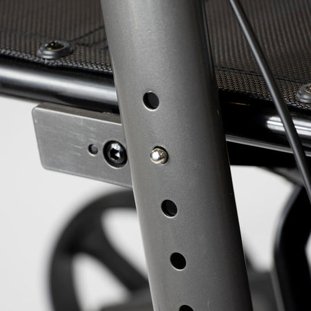 Detail of the height-adjustable frame on NRS 4 Wheel Triple Fold Aluminium Rollator rollator with holes and push-button.