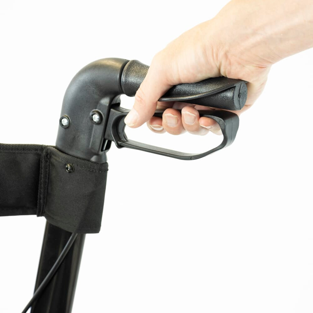 Close-up of a hand squeezing the brake lever on NRS 4 Wheel Triple Fold Aluminium Rollator rollator's handle.