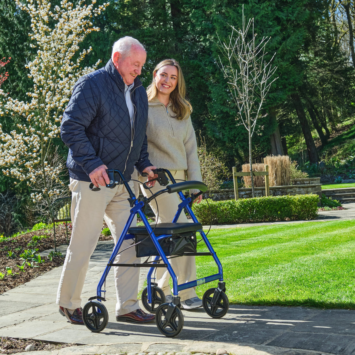 NRS A-Series Lightweight 4 Wheel Rollator rollator folded from the front, demonstrating its slim, space-saving design.