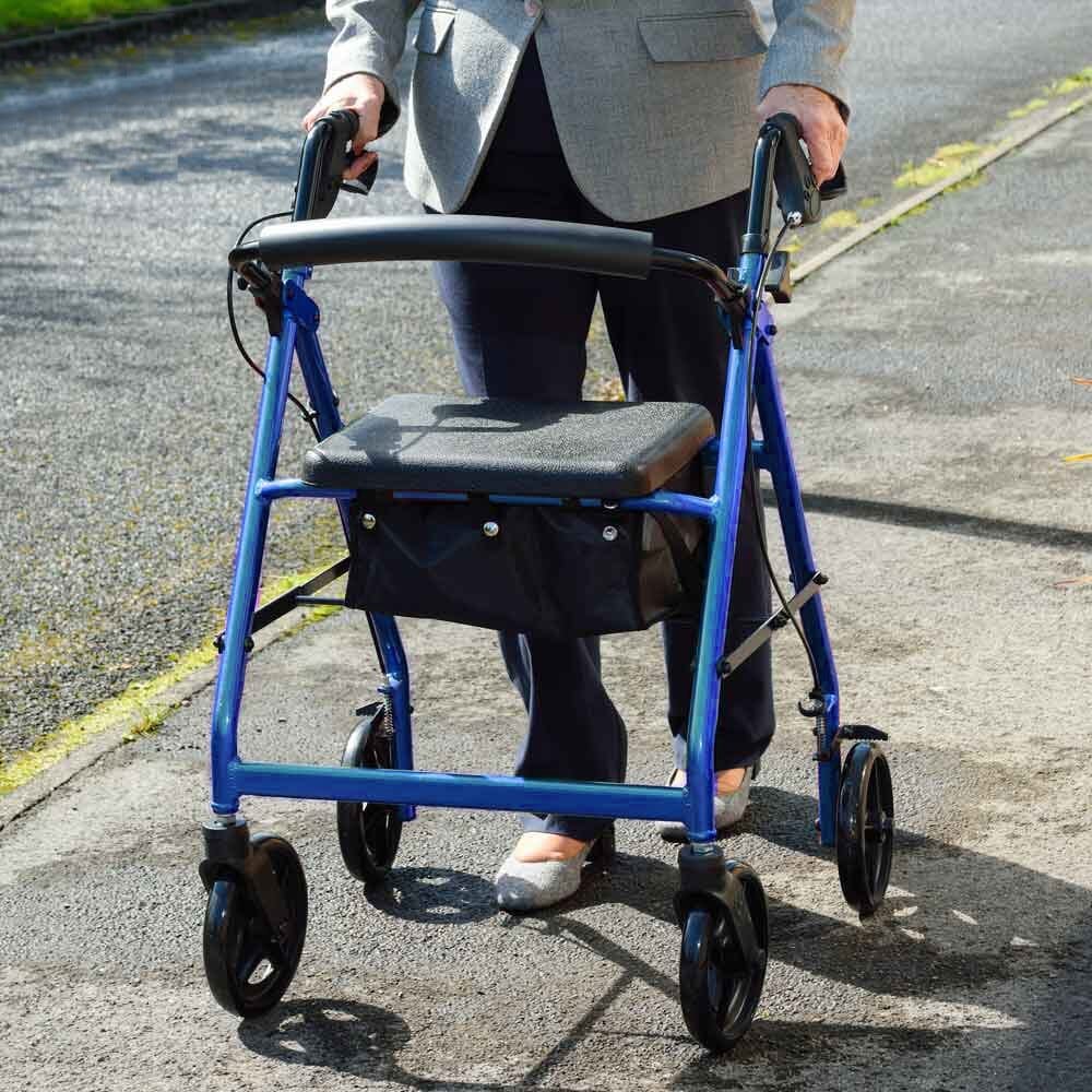 NRS A-Series Lightweight 4 Wheel Rollator rollator folded from the front, demonstrating its slim, space-saving design.