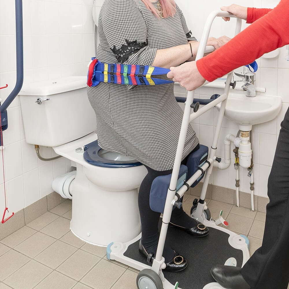 Close-up of the sling attachment points or spreader bar on NRS Atlas Advance Transfer Safety Strap hoist.