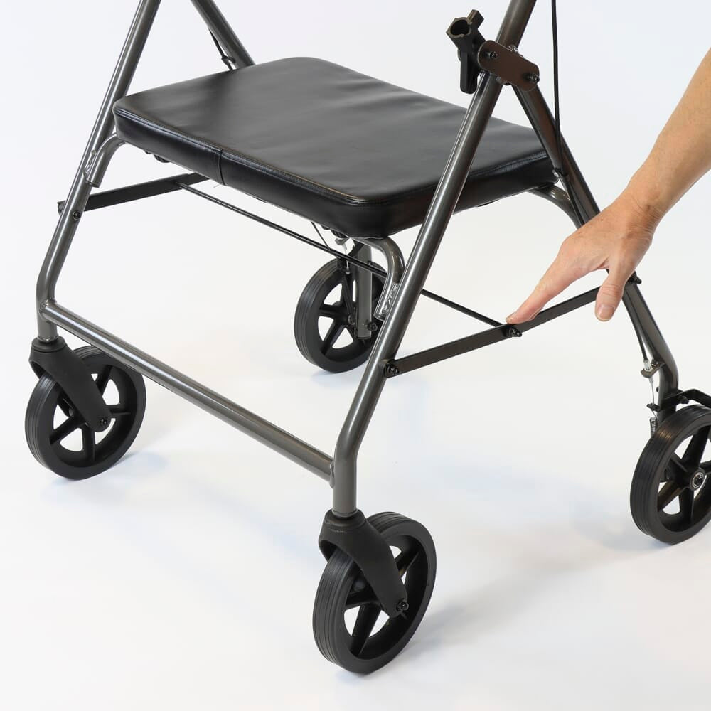 Detail of the height-adjustable frame on NRS Bariatric 4 Wheel Aluminium Rollator rollator with holes and push-button.
