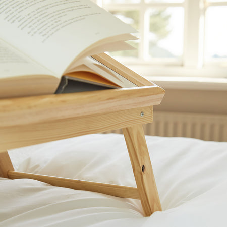 Close-up of the handle on NRS Bed Tray Table tray, showing the comfortable grip.