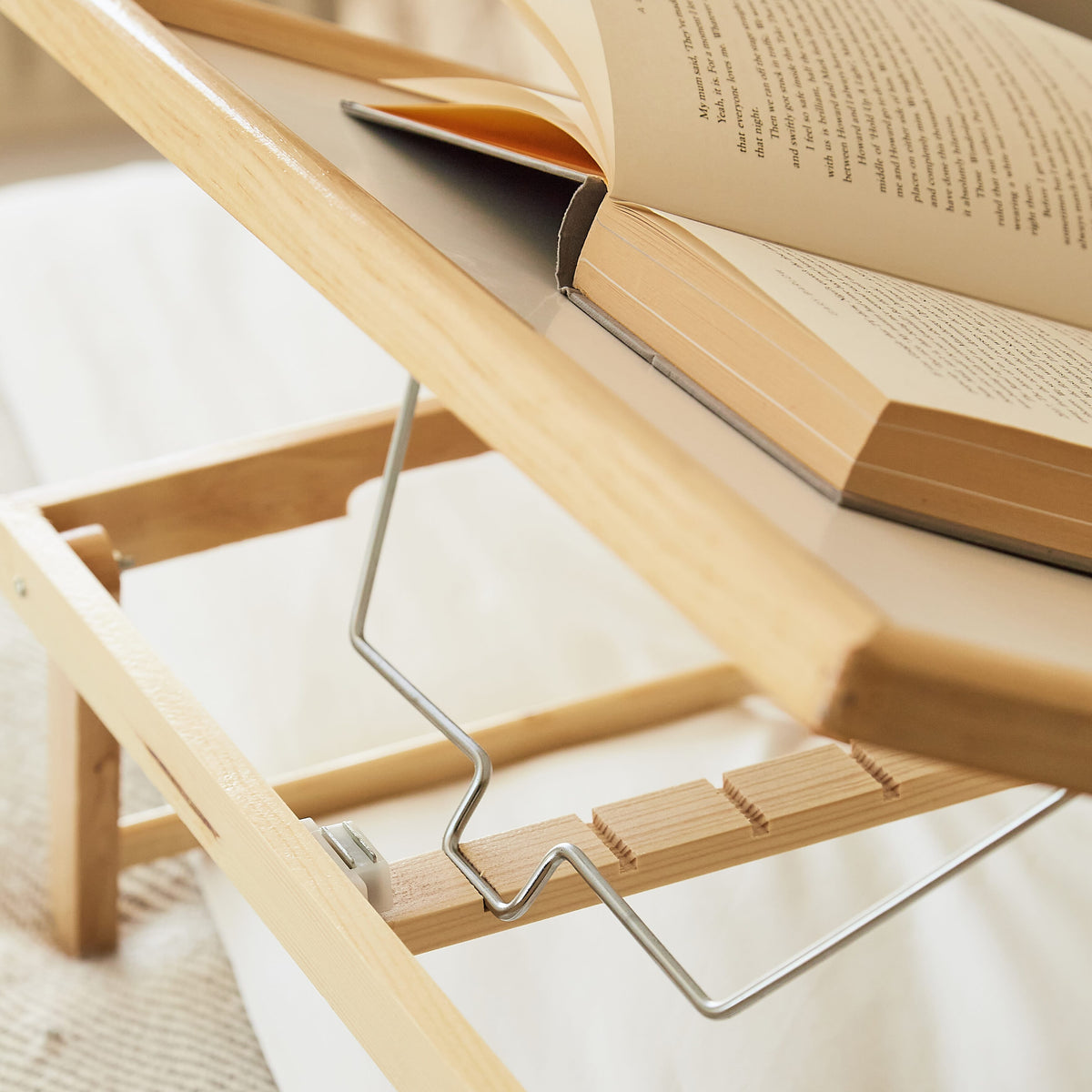 Close-up of the non-slip surface on NRS Bed Tray Table tray, designed to keep items secure.