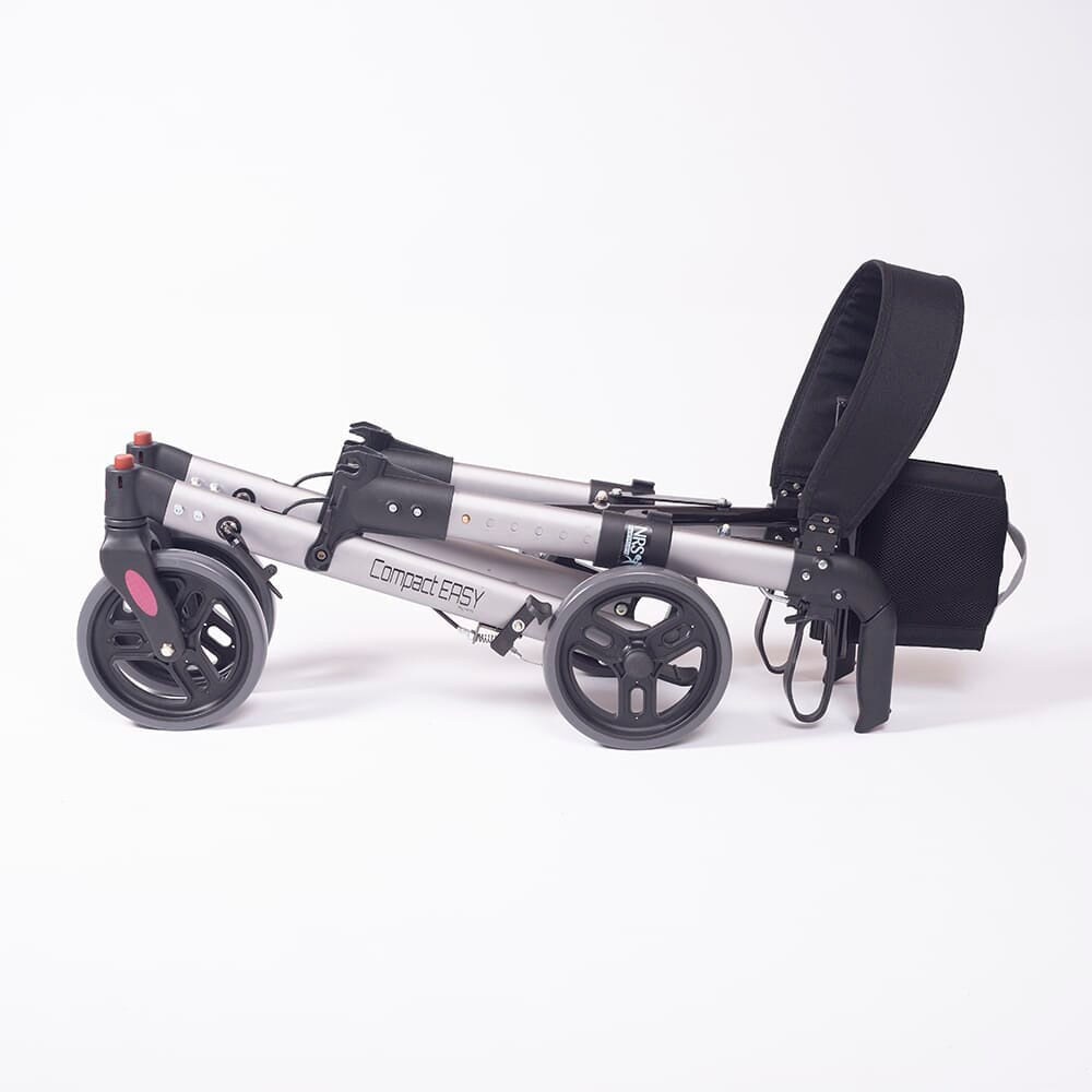 Close-up of a hand squeezing the brake lever on NRS Compact Easy Rollator rollator's handle.