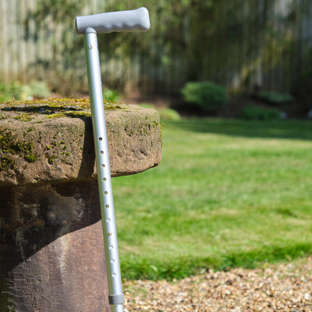 Close-up of the handle on NRS Coopers Adjustable Walking Stick walking stick, highlighting the ergonomic grip.