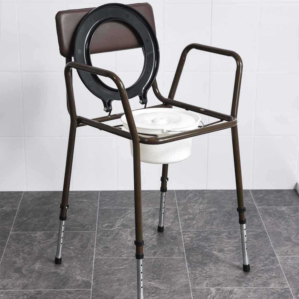 NRS Dovedale Adjustable Commode positioned in a home environment such as a bedroom or bathroom, demonstrating its discreet appearance.