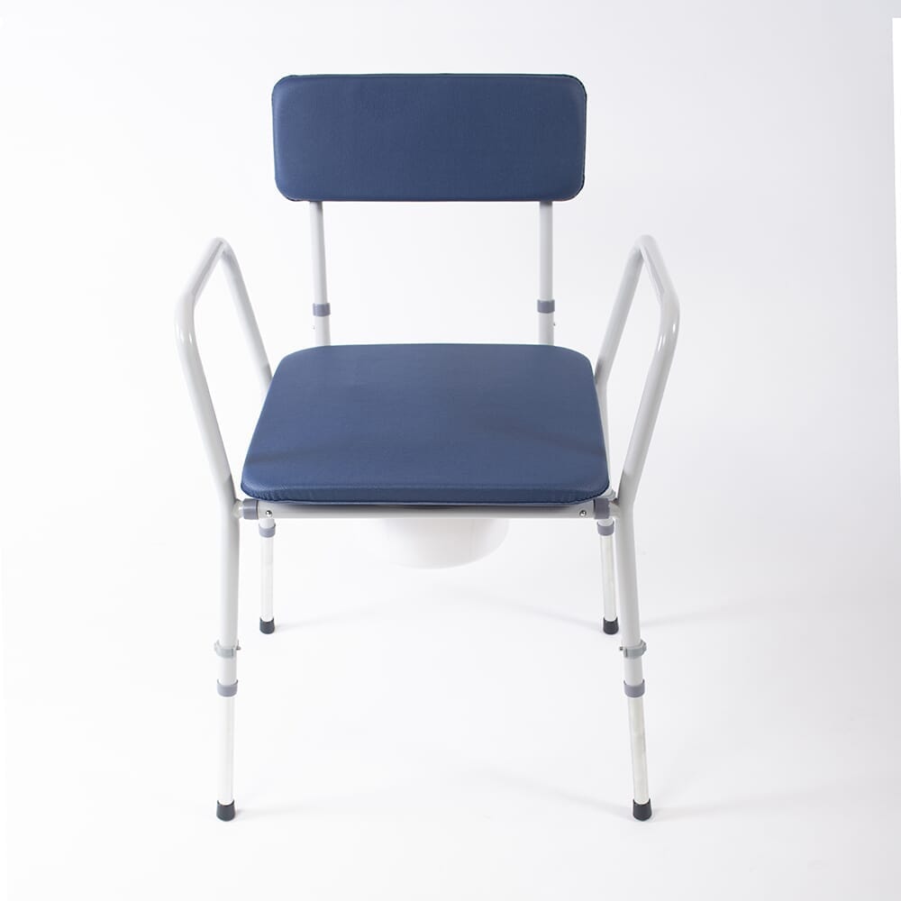 NRS Dovedale Adjustable Commode in use in a home setting, with lid open to illustrate accessibility and convenience.