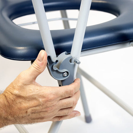 Close-up of the height-adjustable legs or non-slip feet on NRS Dovedale Folding Commode.