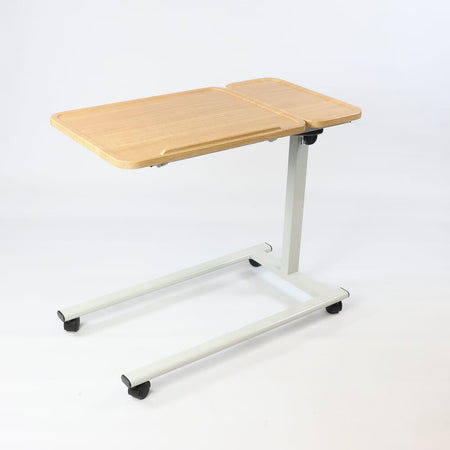 Close-up of hands adjusting the height or tilt of NRS Easylift Home Tilting Overbed Table, showing the easy-turn knobs.