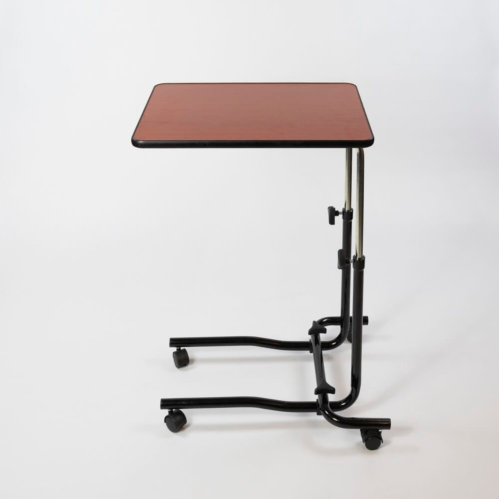 Close-up of hands adjusting the height or tilt of NRS Economy Overbed Table, showing the easy-turn knobs.