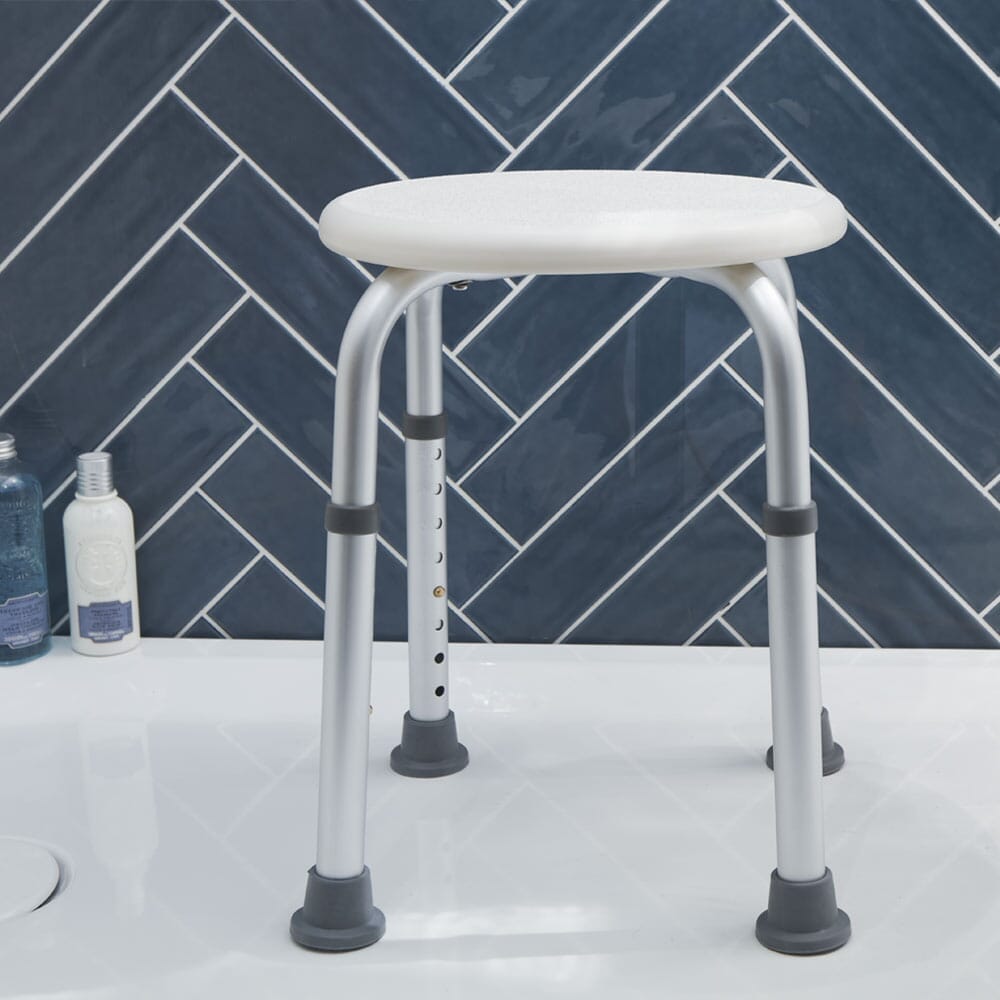 Top view of NRS Economy Shower Stool showing drainage holes in the seat for quick water runoff.