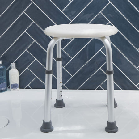 Top view of NRS Economy Shower Stool showing drainage holes in the seat for quick water runoff.