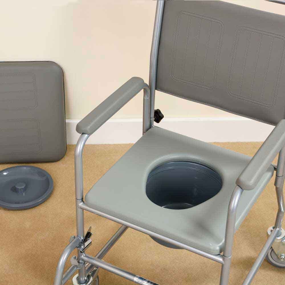 NRS Economy Wheeled Commode with lid closed, highlighting the padded seat and discreet design.