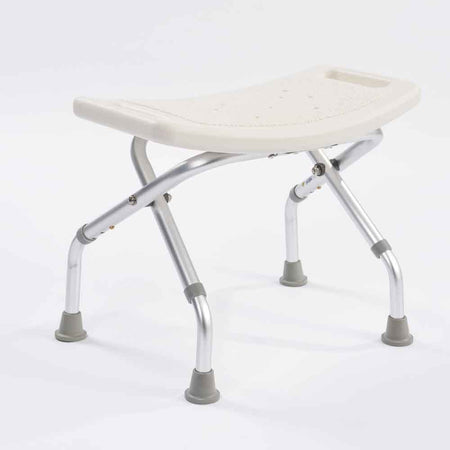 Angled view of NRS Foldable Shower Stool shower stool with moulded seat and height-adjustable legs on a plain background.