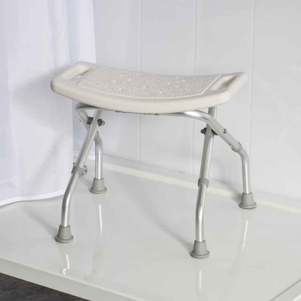Side view of NRS Foldable Shower Stool highlighting the lightweight aluminium legs and non-slip ferrules.