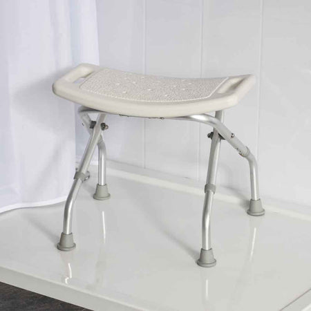 Side view of NRS Foldable Shower Stool highlighting the lightweight aluminium legs and non-slip ferrules.