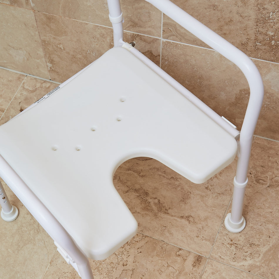 Front view of NRS Folding Shower Chair showing drainage holes in the seat and the supportive backrest design.