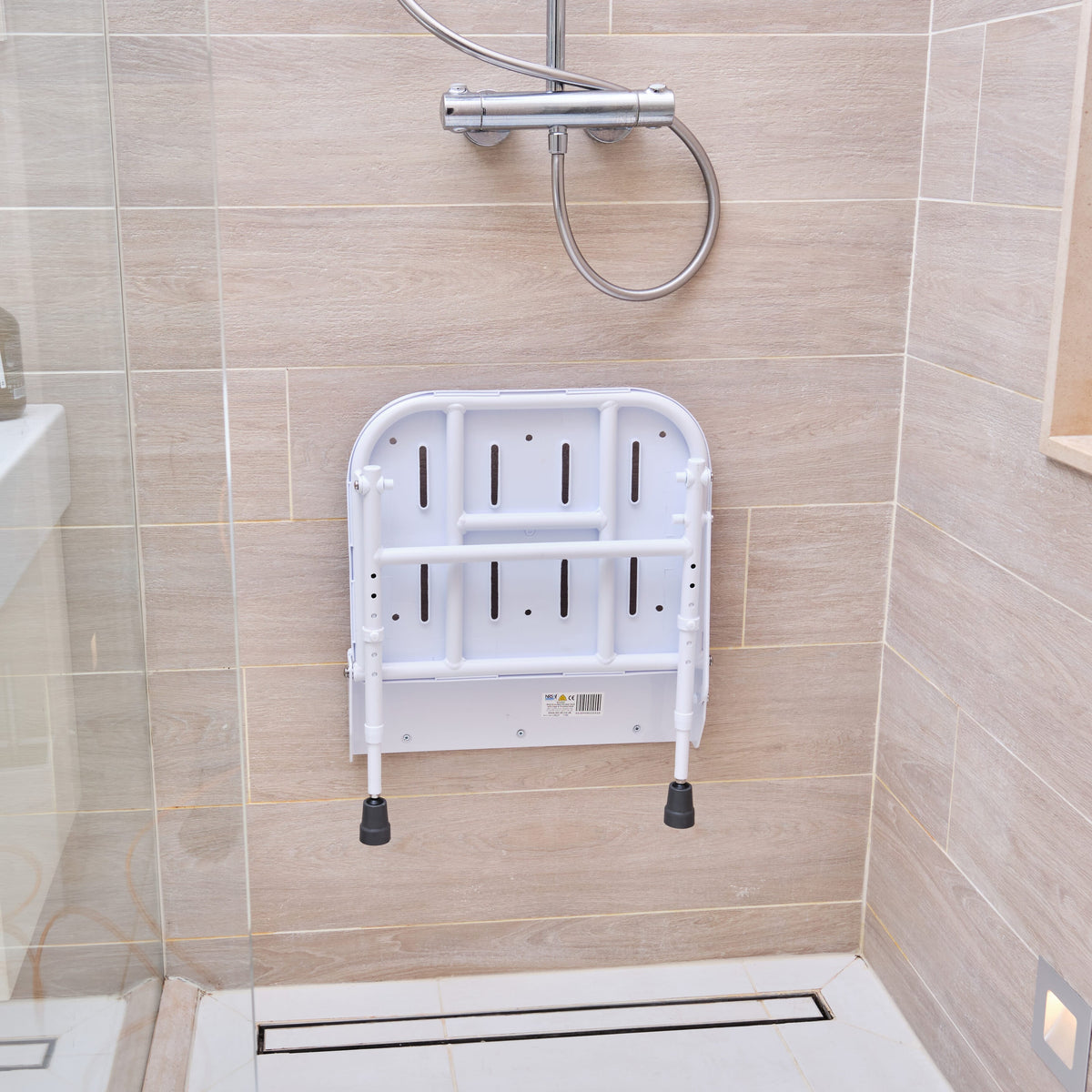 Alternative view of NRS Folding Shower Seat with Legs, showing different angle or usage.