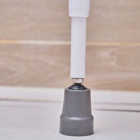 Lifestyle image of NRS Folding Shower Seat with Legs being used in a real-life setting.