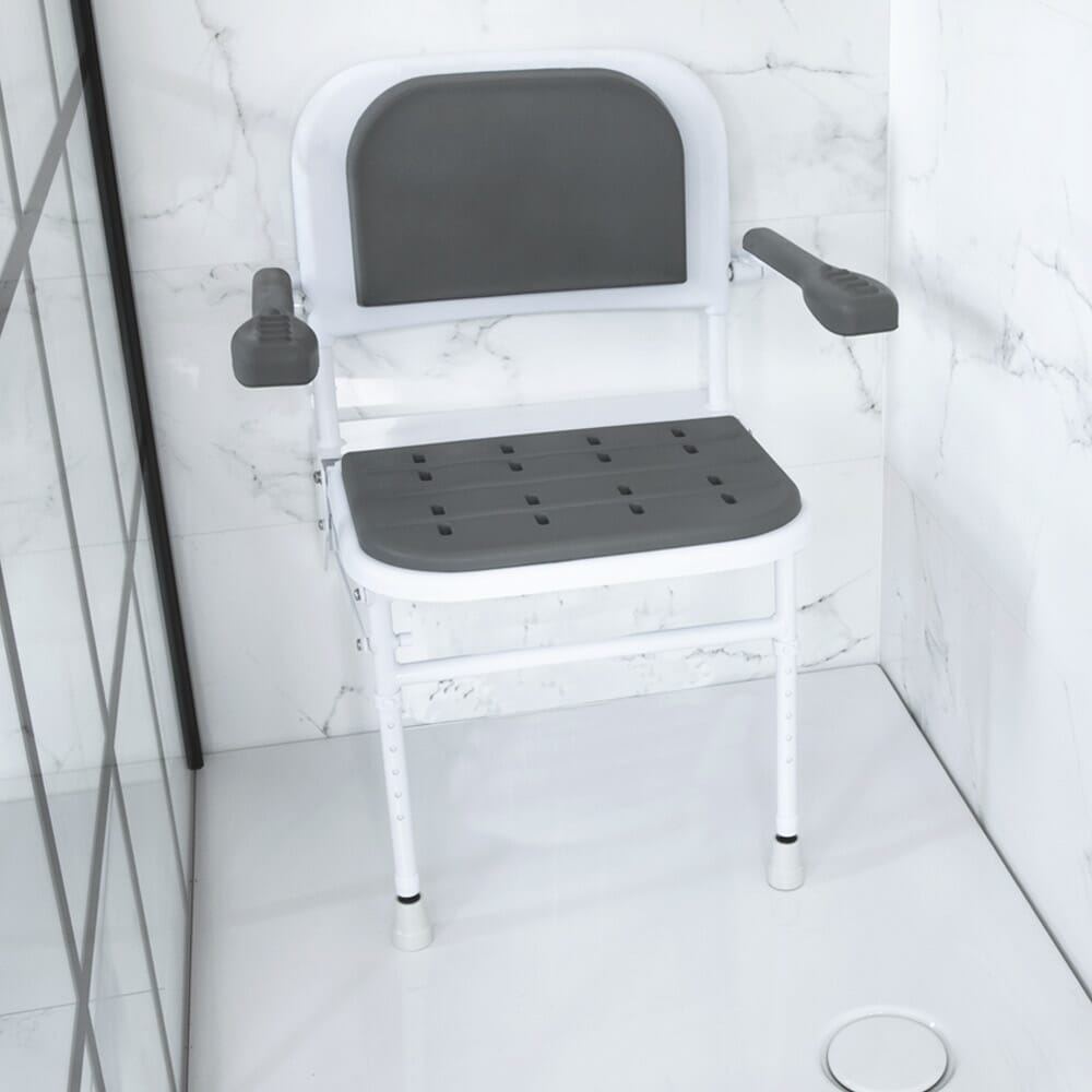 Image of NRS Folding Shower Seat with Legs, Padded Seat, Back, and Arms on a plain background.