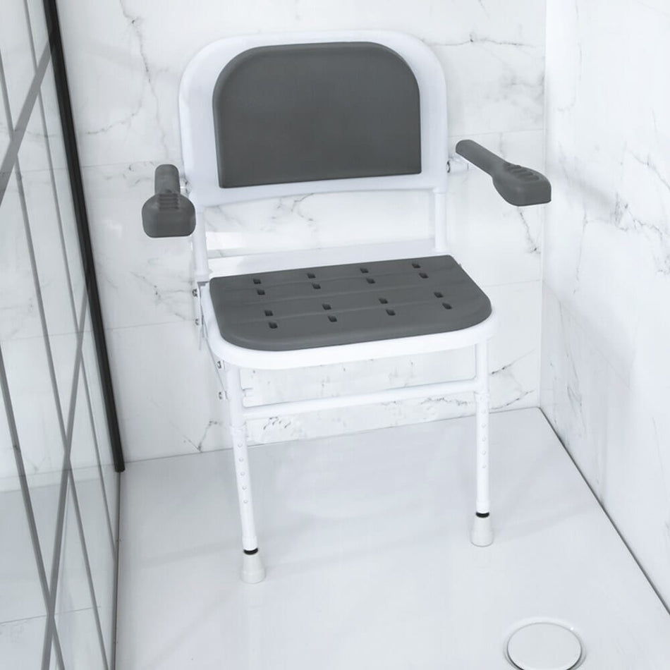 Image of NRS Folding Shower Seat with Legs, Padded Seat, Back, and Arms on a plain background.