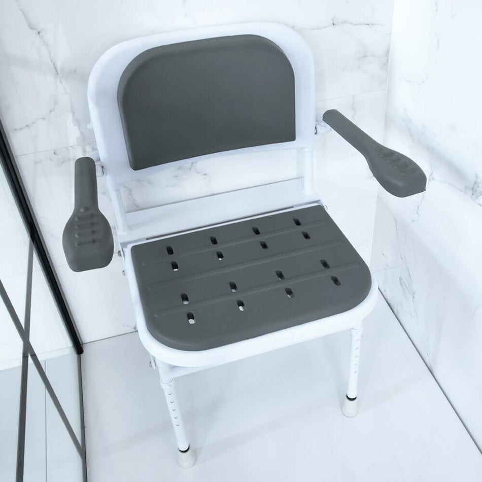 Alternative view of NRS Folding Shower Seat with Legs, Padded Seat, Back, and Arms, showing different angle or usage.