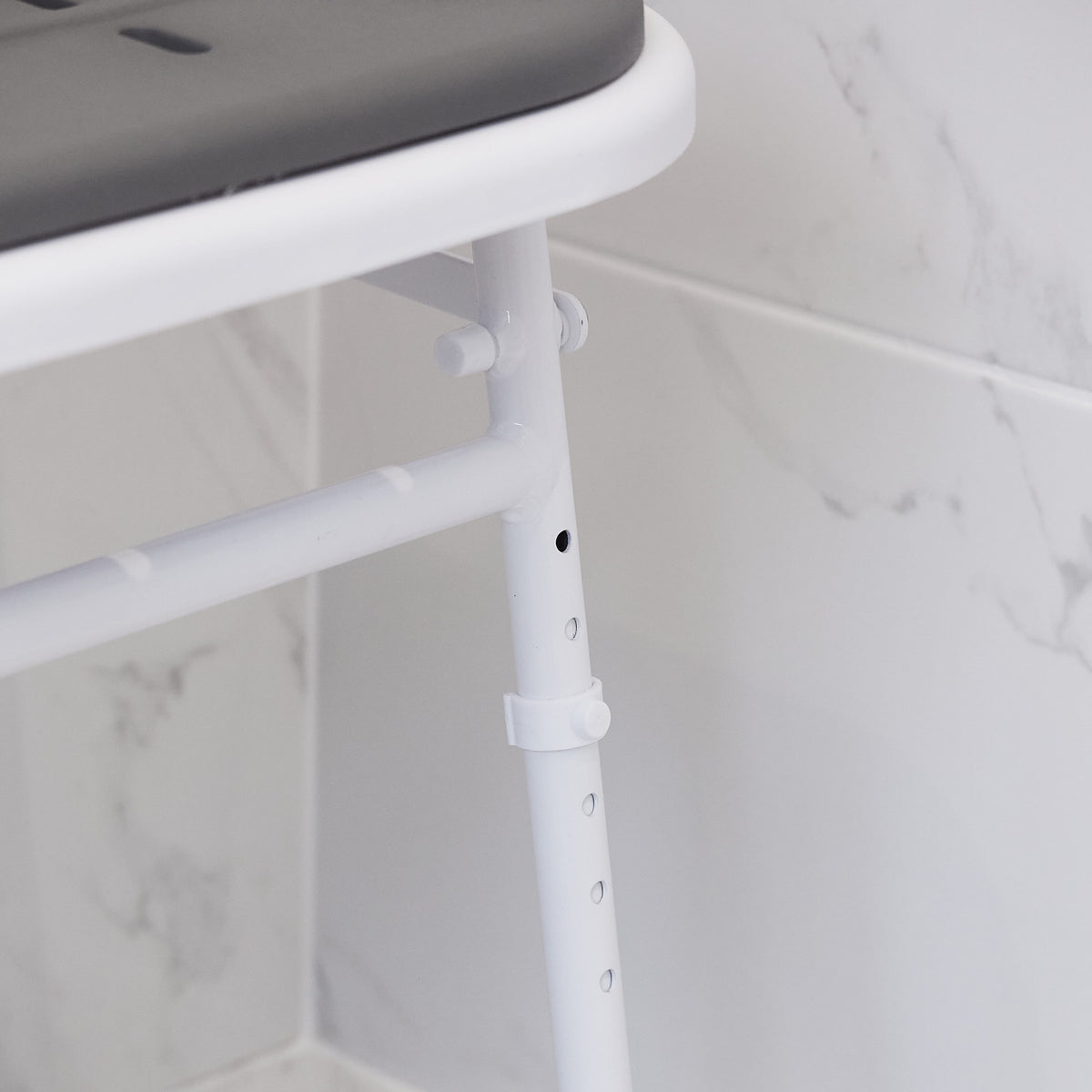 Diagram or packaging of NRS Folding Shower Seat with Legs and Padded Seat highlighting dimensions or features.