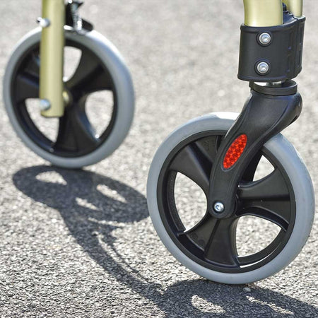 Close-up of the front wheel and fork on NRS Freestyle 3 Wheel Rollator rollator showing manoeuvrability.