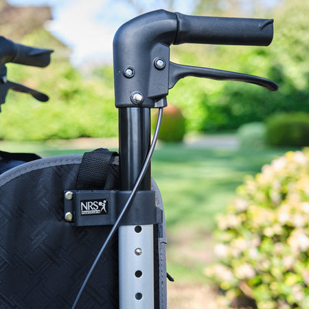 Close-up of the handle and brake lever on NRS Freestyle 3 Wheel Rollator rollator, emphasising the easy-grip design.