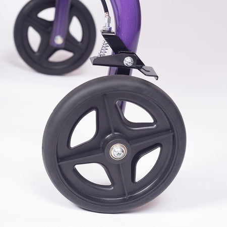 NRS Freestyle 3 Wheel Rollator three-wheel rollator folded for storage, showing its compact design.