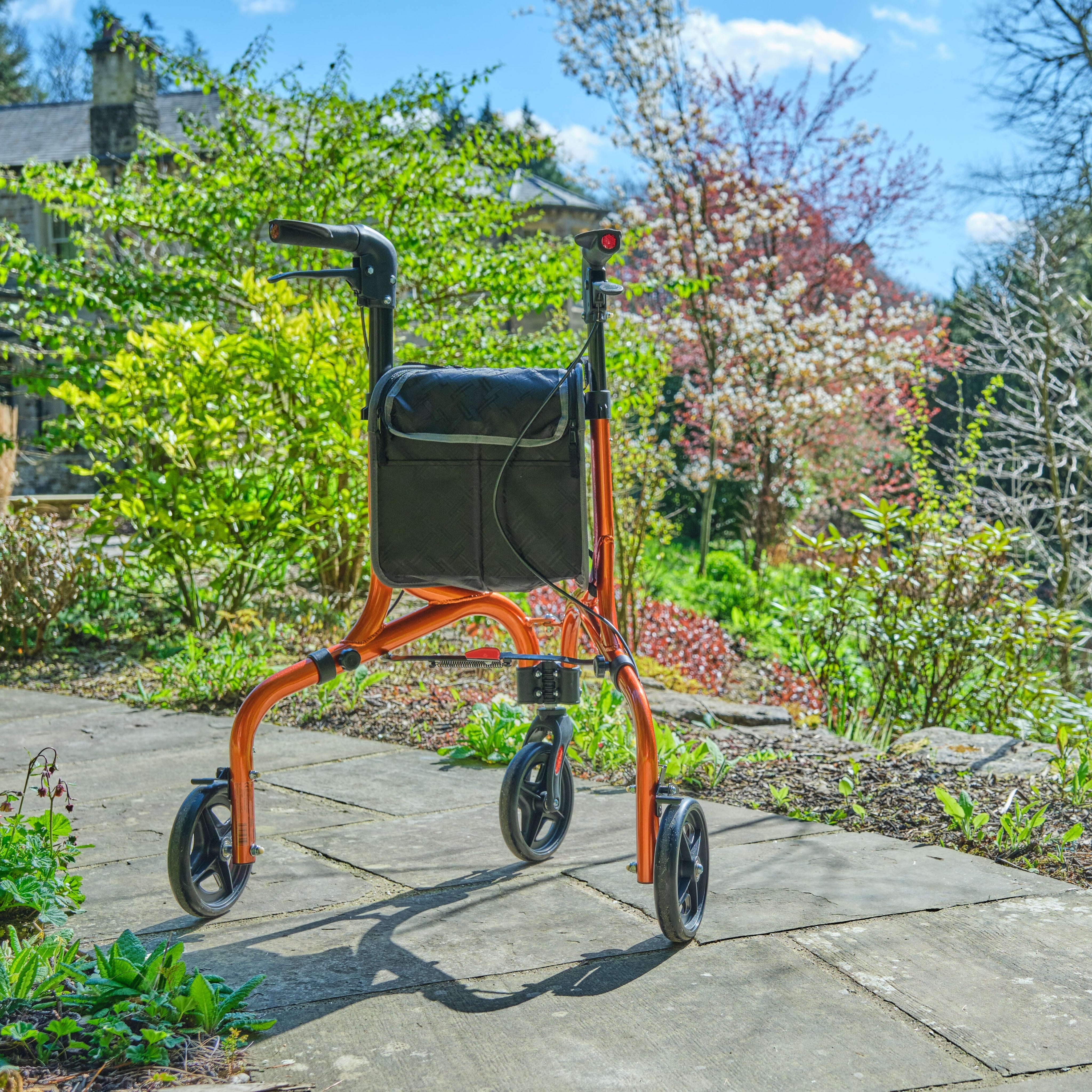 Close-up of the handle and brake lever on NRS Freestyle 3 Wheel Rollator rollator, emphasising the easy-grip design.