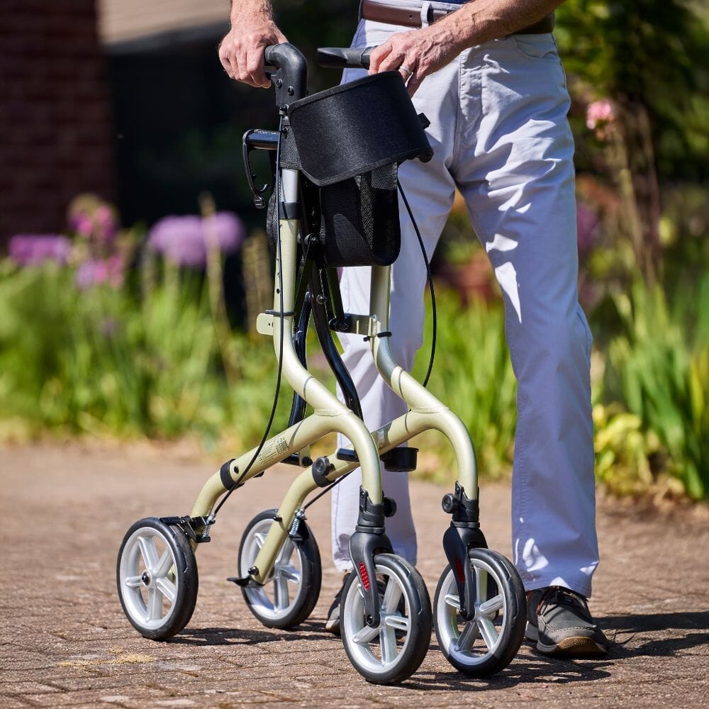 Front view of NRS Freestyle 4 Wheel Rollator rollator with seat and padded backrest, showing the handlebars and brake cables.