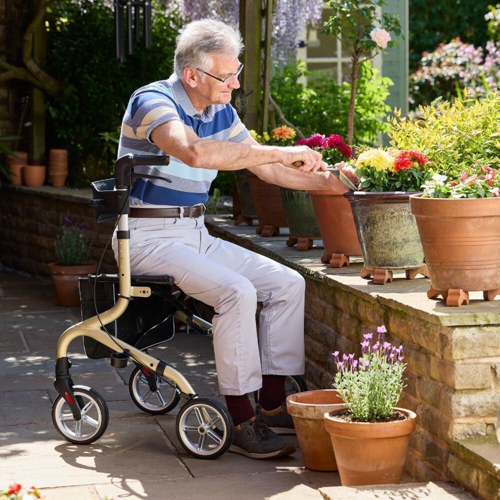 NRS Freestyle 4 Wheel Rollator rollator folded from the front, demonstrating its slim, space-saving design.