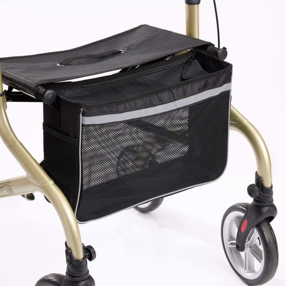 Person removing or attaching the under-seat storage bag on NRS Freestyle 4 Wheel Rollator rollator.