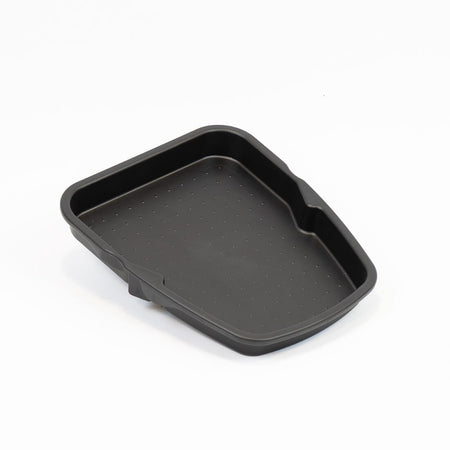 Angled view of NRS Freestyle Rollator Tray rollator with seat, padded backrest, storage bag and four wheels on a plain background.